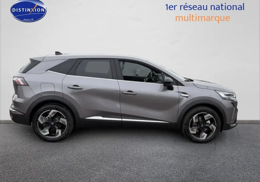 Profil droit du Renault Symbioz gris schiste 2026 avec jantes alliage 18 pouces et lignes sculptées modernes.