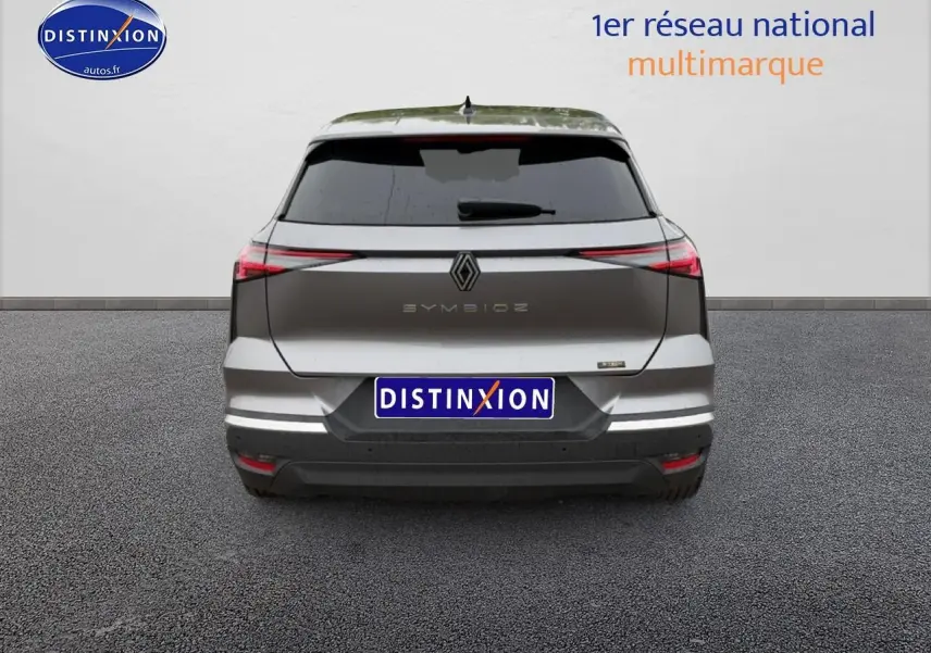 Vue arrière d'une Renault Symbioz gris schiste avec feux arrière LED et lunette surteintée.