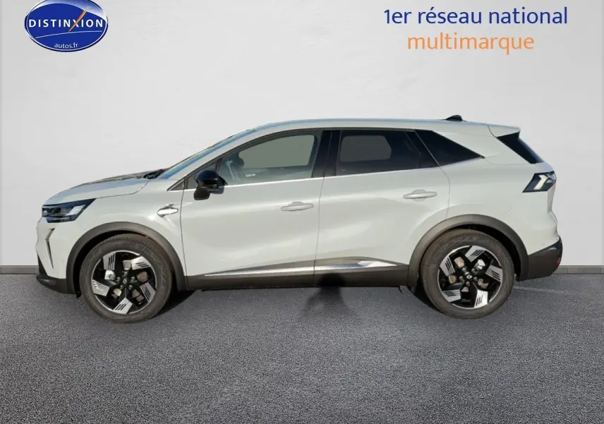 Renault Symbioz gris rafale vu de profil côté gauche, avec jantes alliage noires et vitres surteintées.