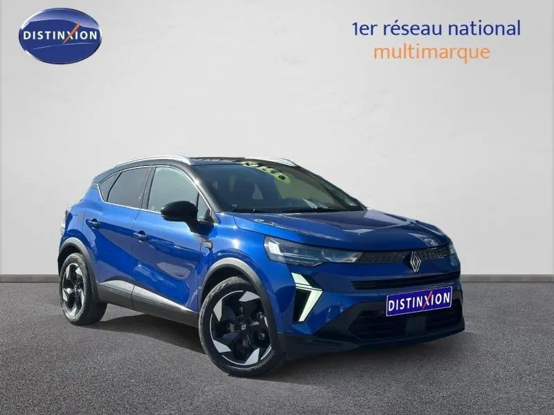 Renault Captur 2025 bleu Iron/Noir Etoilé en 3/4 avant droit, SUV compact avec jantes noires distinctives.