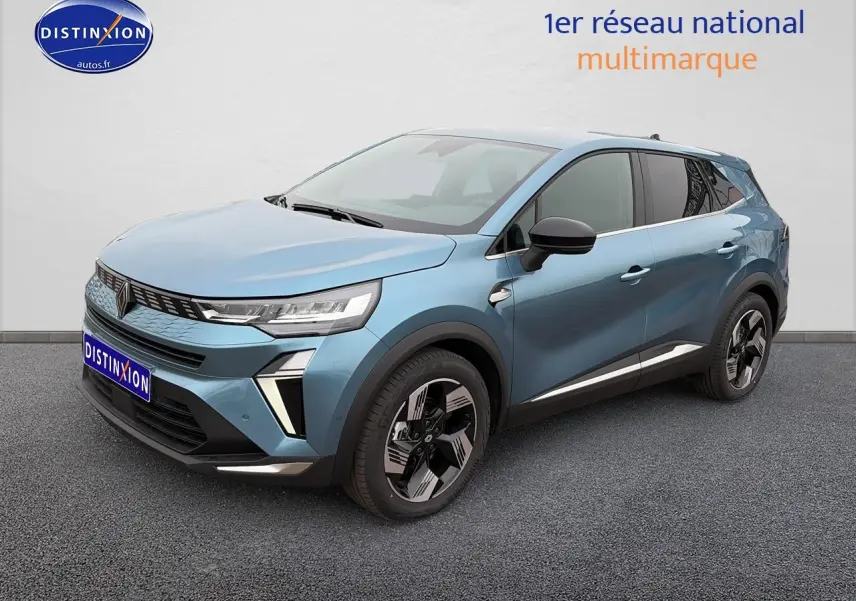Renault Symbioz bleu mercure en 3/4 avant droit, avec jantes alliage et phares LED distinctifs.