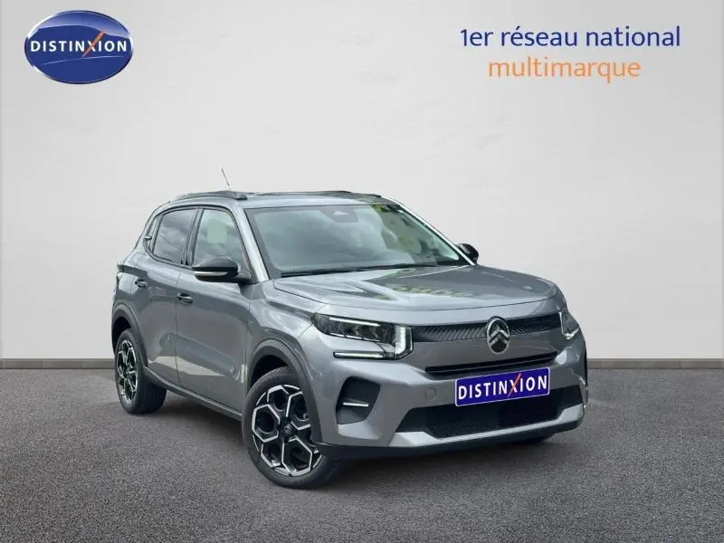 Citroën C3 1.2 Turbo 100ch MAX gris Mercury vue 3/4 avant avec jantes noires et détails modernes.