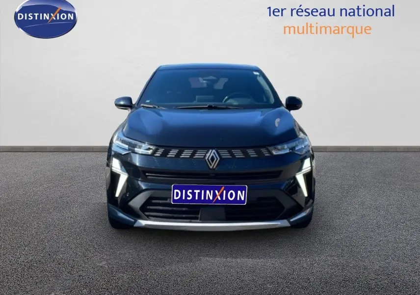 Vue frontale d'une Renault Symbioz noire étoile métal 2025 avec calandre moderne et éclairage LED distinctif.