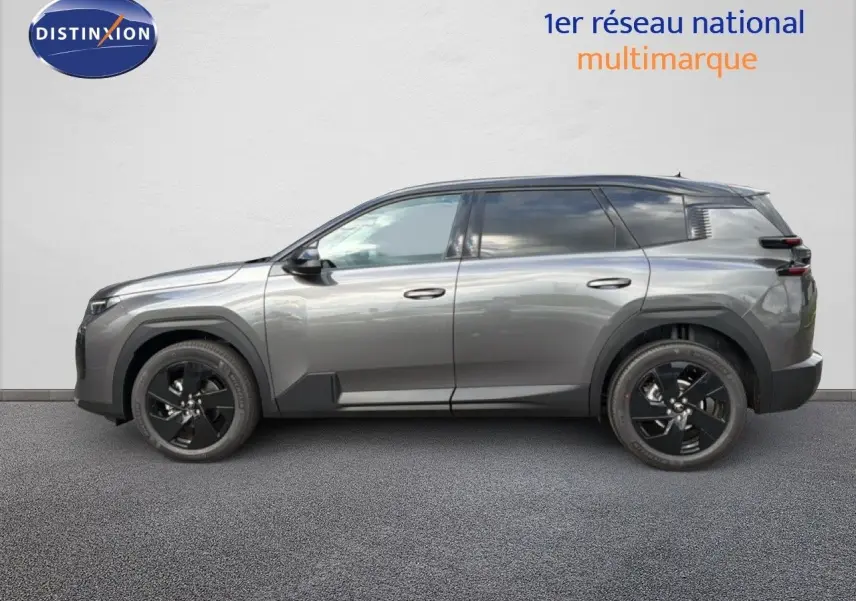 Vue de profil côté gauche du Citroën C5 Aircross Hybrid gris platinium avec jantes noires et détails noirs contrastants.