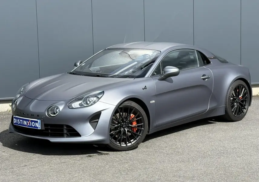 Alpine A110 1.8T 292 S gris Tonnerre Mat vue 3/4 avant avec jantes noires et étriers de frein orange.