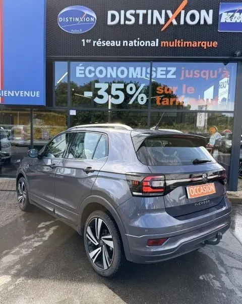 Volkswagen T-Cross 1.0 TSI R-Line gris foncé vue 3/4 arrière droit devant concession multimarque