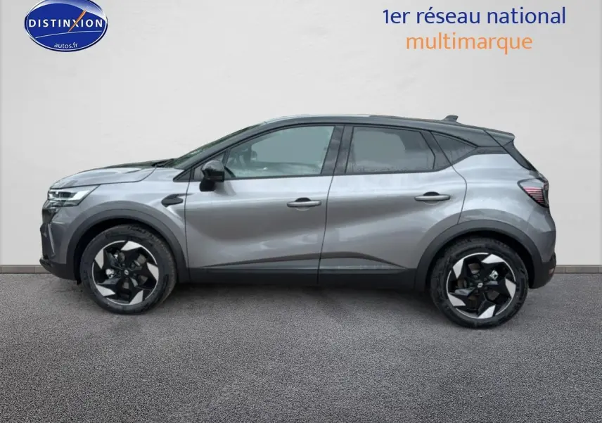 Profil droit du Renault Captur gris cassiopée avec toit noir, roues alliage et lignes modernes visibles.
