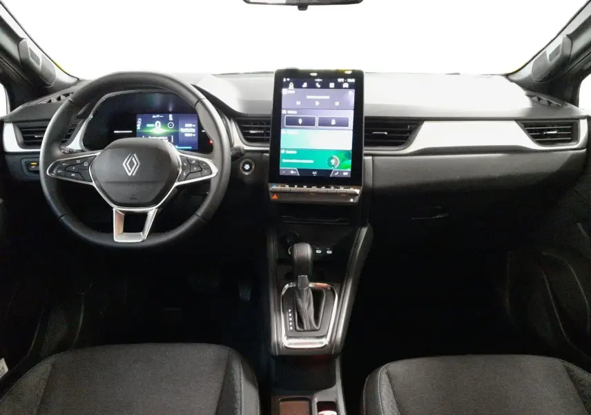 Vue intérieure avant du Renault Symbioz gris cassiopée, avec tableau de bord numérique et écran tactile vertical central.