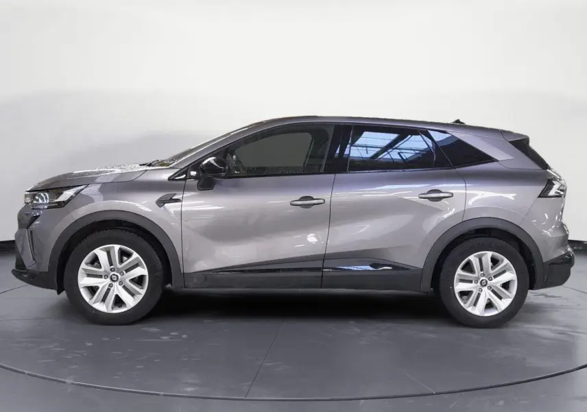 Profil côté gauche du Renault Symbioz E-Tech Full Hybrid 145 Evolution gris Cassiopée, SUV compact aux lignes fluides et modernes.