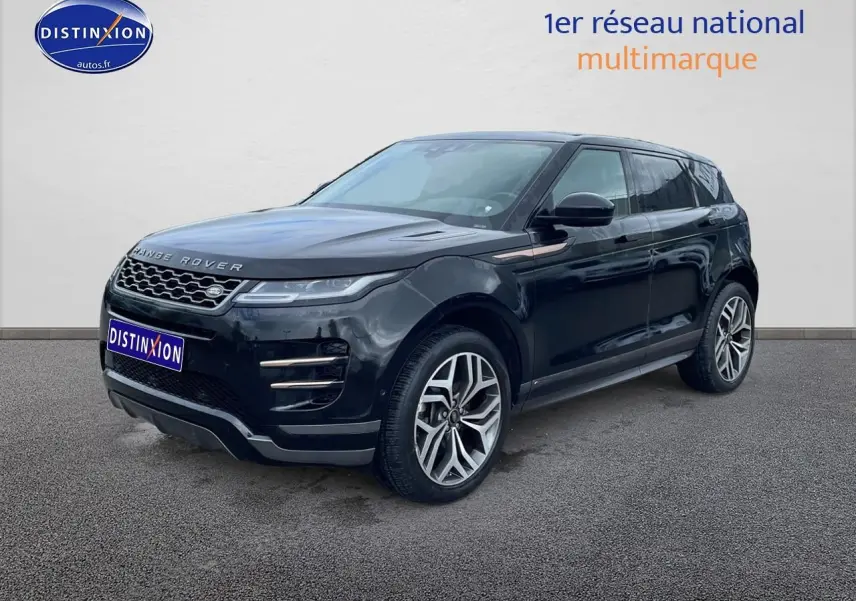 Range Rover Evoque noir vu en 3/4 avant droit, avec jantes alliage et calandre distinctive.