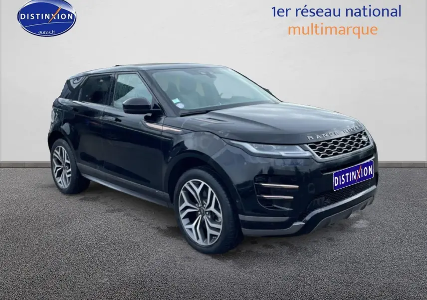 Range Rover Evoque noir en 3/4 avant droit, avec jantes alliage et calandre distinctive visible.