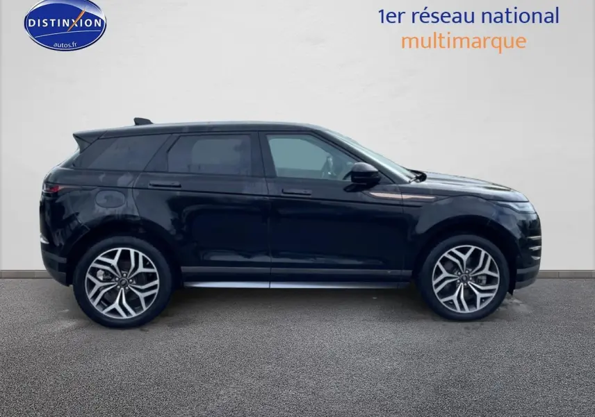 Profil latéral gauche d'un Range Rover Evoque noir 2020 avec jantes alliage et toit panoramique.