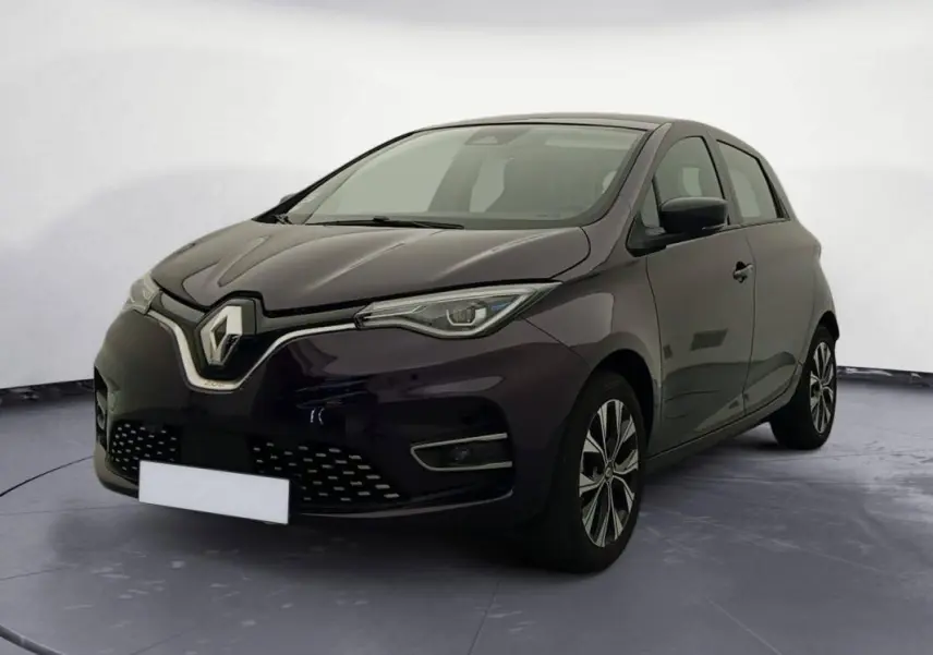 Renault ZOE E-Tech électrique violet en 3/4 avant droit, avec calandre distinctive et jantes stylisées.