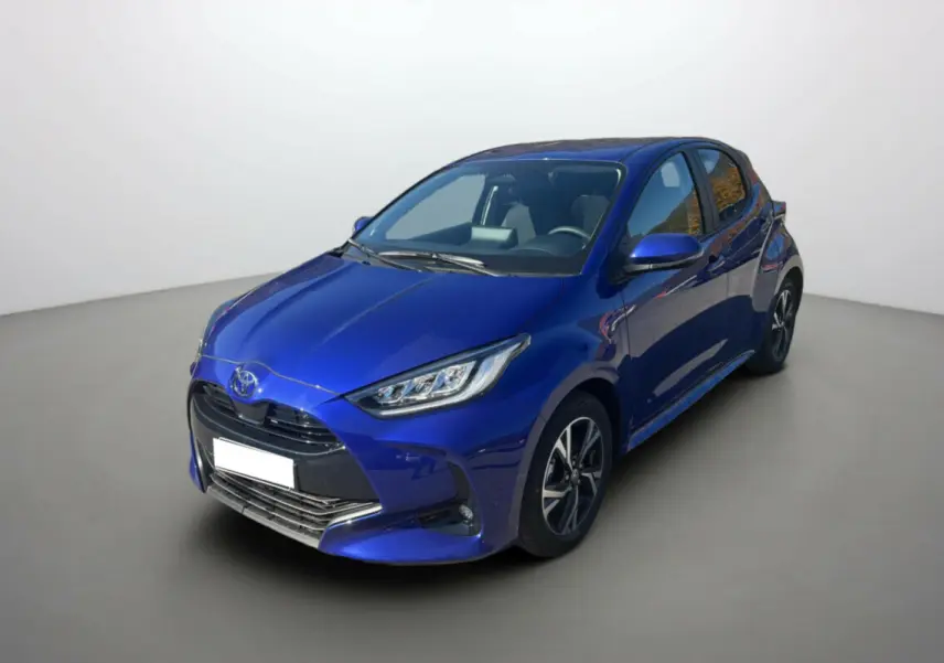 Toyota Yaris 1.5 Hybrid 2025 bleu genievre vue 3/4 avant droit avec phares LED et jantes alliage.