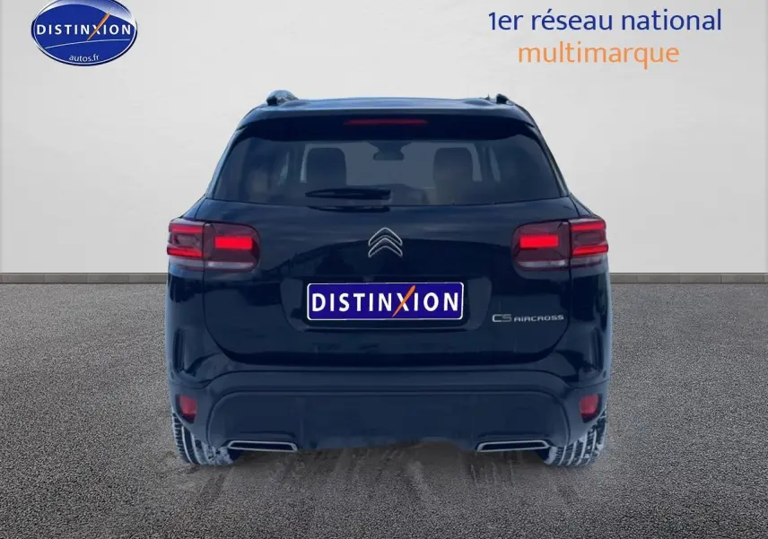 Vue arrière d'un Citroën C5 Aircross noir 2025 avec feux LED et double sortie d'échappement intégrée.