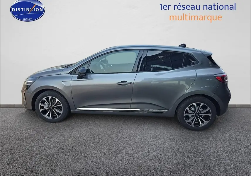 Profil droit d'une Renault Clio V gris schiste 2025 avec jantes alliage et vitres arrière surteintées.