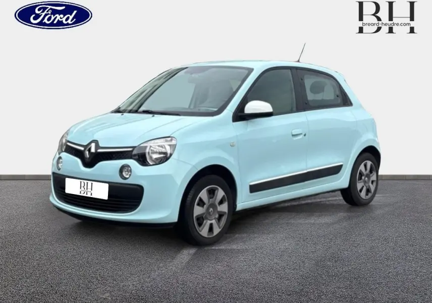 Renault Twingo bleu dragée vue en 3/4 avant droit, avec rétroviseurs blancs et jantes grises.