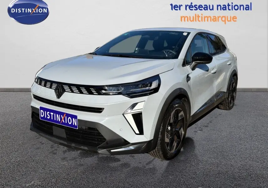 Renault Symbioz E-Tech gris rafale métal en 3/4 avant droit, avec calandre noire et jantes noires distinctives.