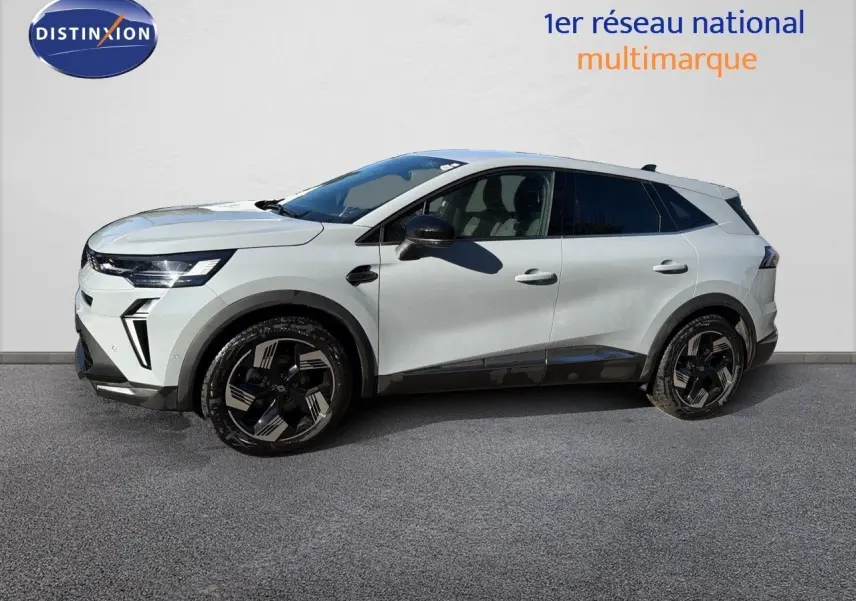 Vue de profil côté gauche d’un Renault Symbioz gris Rafale métal avec jantes noires et détails noirs contrastants.