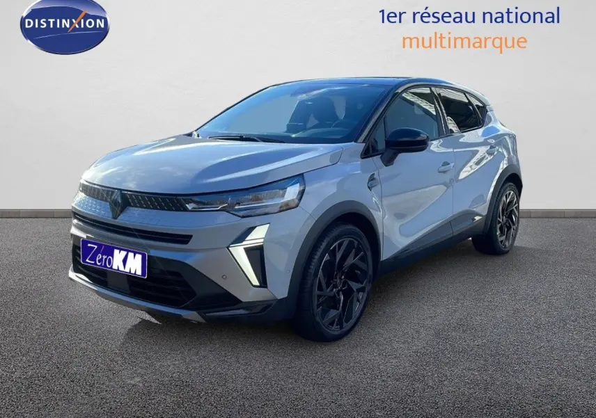 Renault Captur E-Tech hybride gris Rafale métal avec toit noir, vue 3/4 avant droit, jantes noires distinctives.