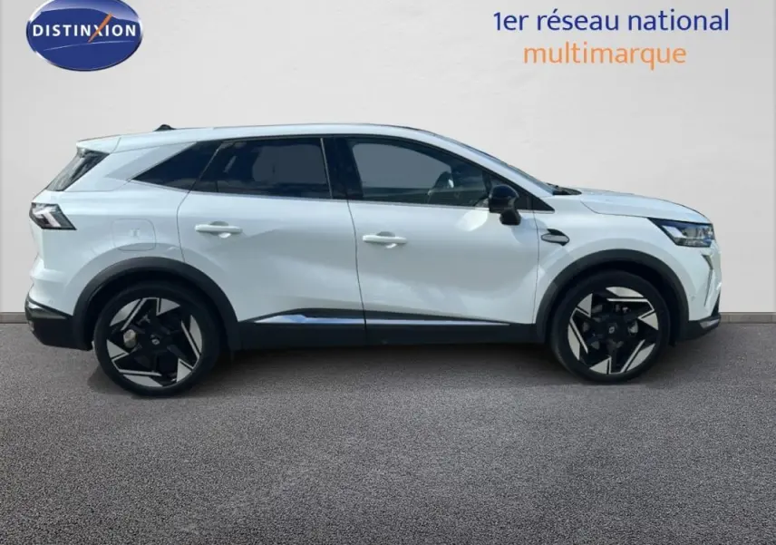 Profil droit d’un Renault SYMBIOZ blanc 2025 avec jantes alliage noires et toit noir contrasté.