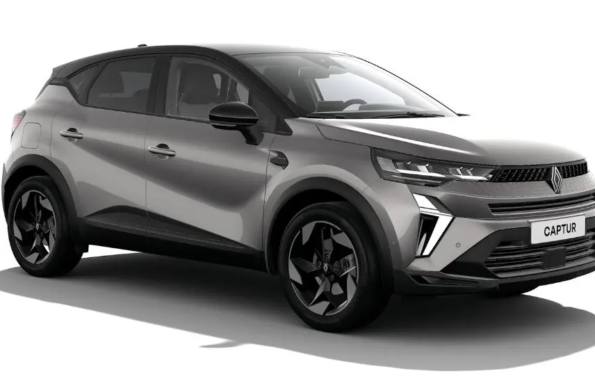 Renault Captur 2025 gris Cassiopée avec toit noir, vue 3/4 avant droit, jantes noires et calandre moderne.