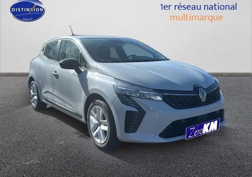 Renault Clio V gris rafale vue 3/4 avant droit avec calandre noire et jantes alliage cinq branches.