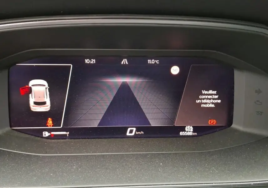 Affichage numérique du tableau de bord du CUPRA Formentor noir, montrant la vitesse à 0 km/h et une porte ouverte.