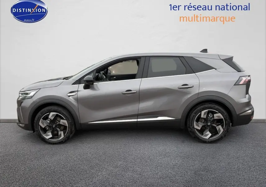 Renault Symbioz gris schiste en profil droit, SUV hybride 2026 avec jantes alliage et lignes modernes.