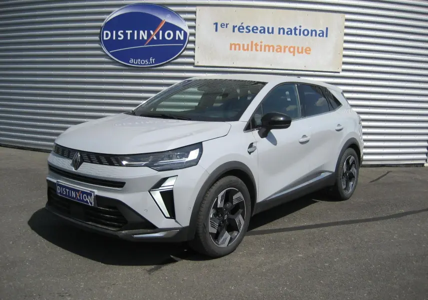 Renault Symbioz 2025 gris Rafale en vue 3/4 avant, avec feux LED et jantes bi-ton distinctives.