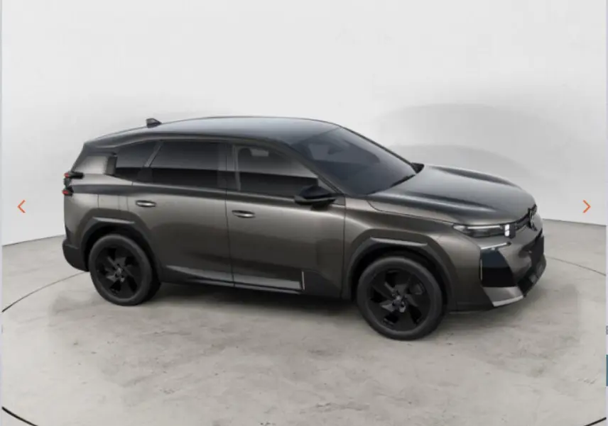 Vue de profil côté gauche du Citroën C5 Aircross gris avec jantes noires et vitres teintées.