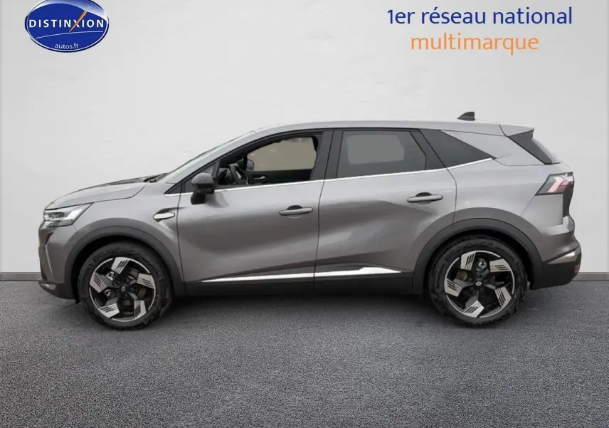 Renault Symbioz gris schiste vu de profil côté gauche, avec jantes alliage et rétroviseurs noirs grainés.