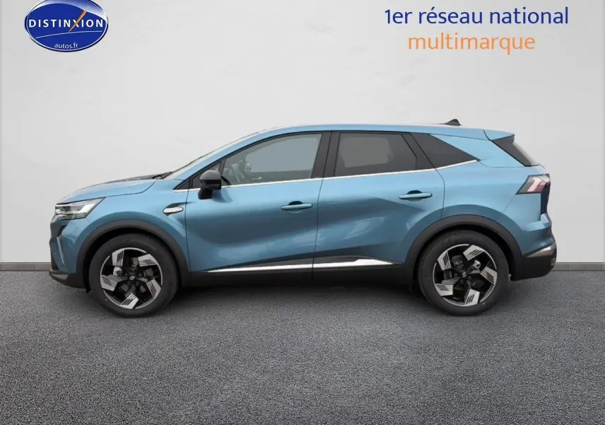 Profil droit du Renault Symbioz 1.8 e-tech full hybrid 160 bleu mercure avec jantes alliage et rétroviseurs noirs.