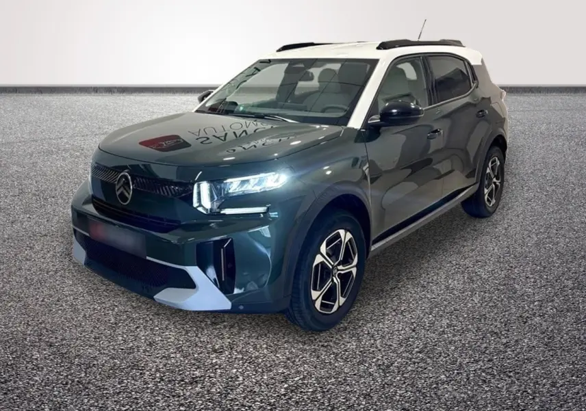 SUV Citroën C3 Aircross hybride vert 3/4 avant droit avec toit blanc et feux LED allumés.