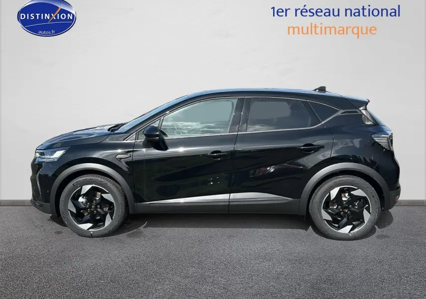 Profil droit du Renault Captur 1.6 e-tech hybride 2025 noir étoile avec jantes alu bicolores et vitres teintées.