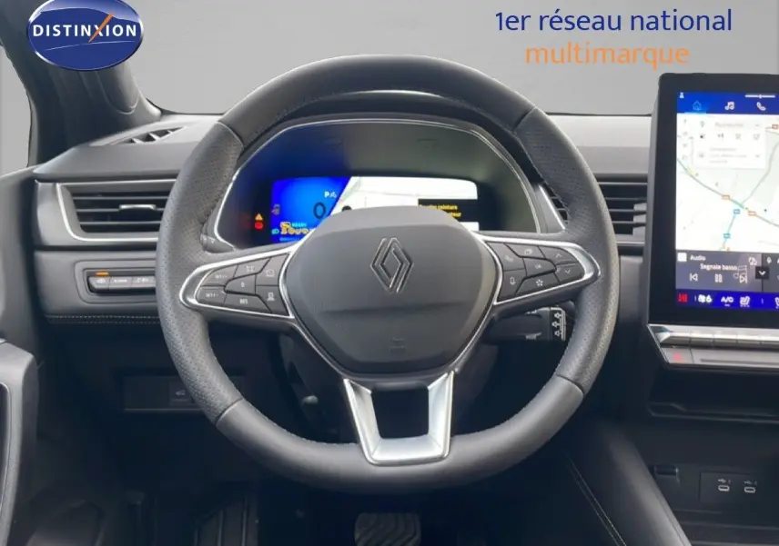 Vue intérieure centrée sur le volant et le tableau de bord numérique du Renault Symbioz noir étoile métal 2025.