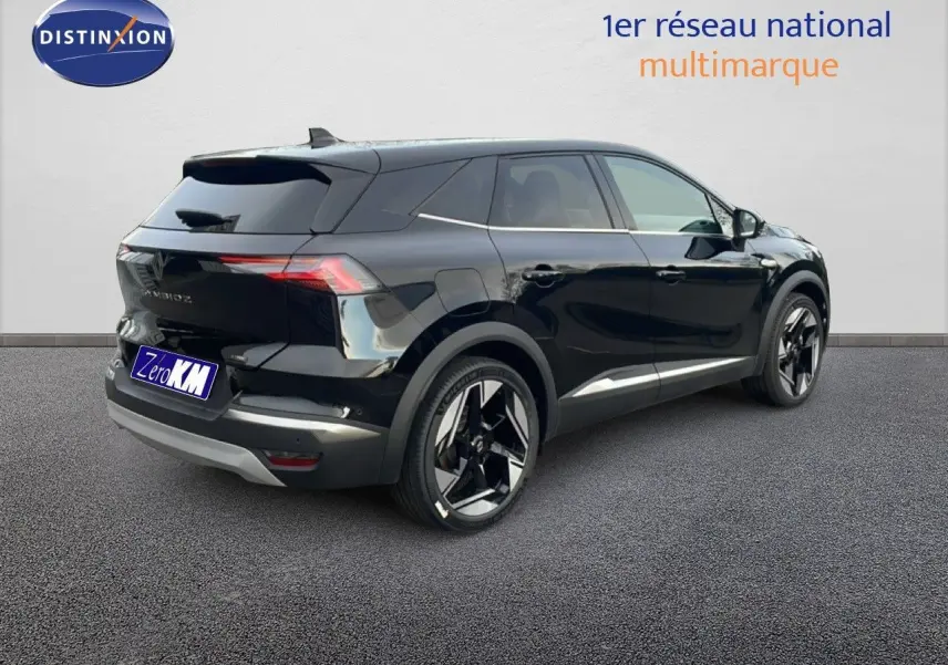 Renault Symbioz noir étoile métal en vue 3/4 arrière droit, soulignant ses lignes modernes et ses jantes bicolores.