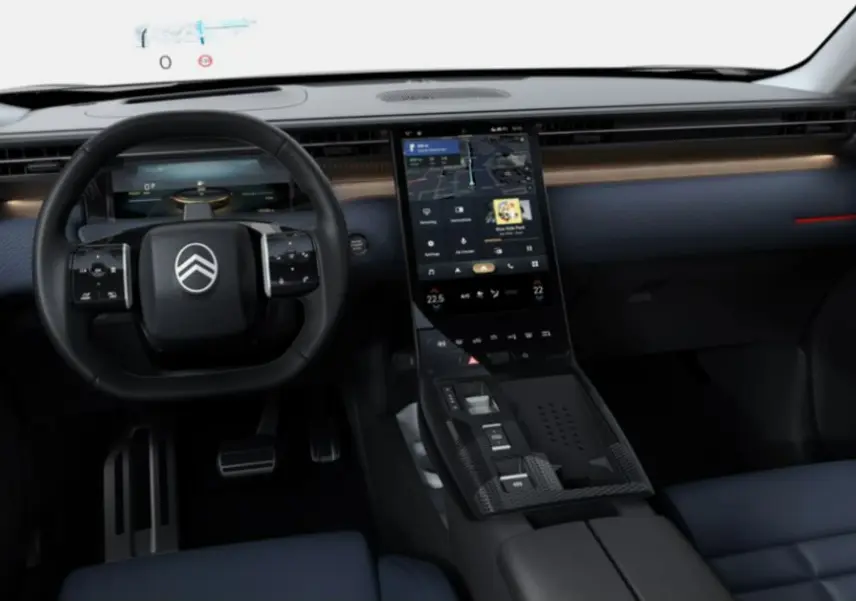 Vue intérieure avant du Citroën C5 Aircross II Hybrid avec tableau de bord moderne et sièges bleu foncé.