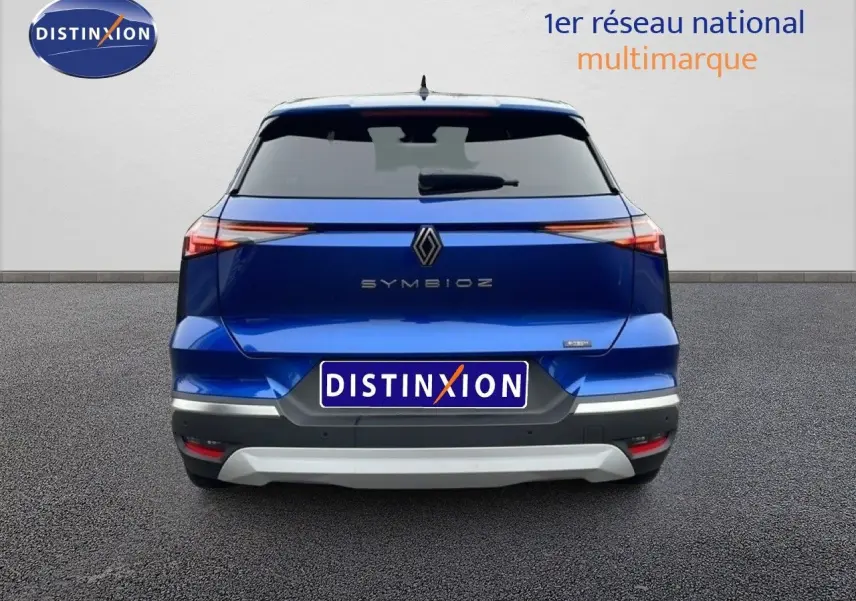 Vue arrière d'une Renault SYMBIOZ bleu iron metal 2025 avec feux LED fins et hayon fermé.