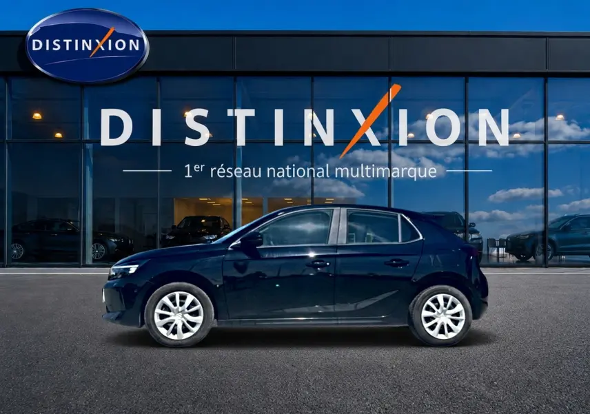 Opel Corsa 1.2 turbo 100 edition bva8 noire vue de profil côté gauche, avec enjoliveurs blancs distinctifs.