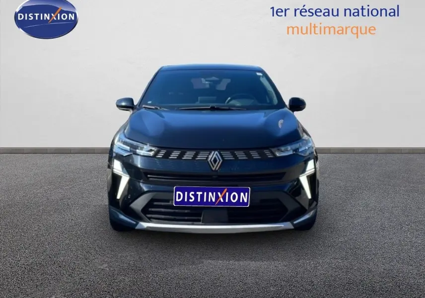 Vue frontale d'une Renault Symbioz noire étoile métal 2025 avec calandre distinctive et éclairage LED moderne.