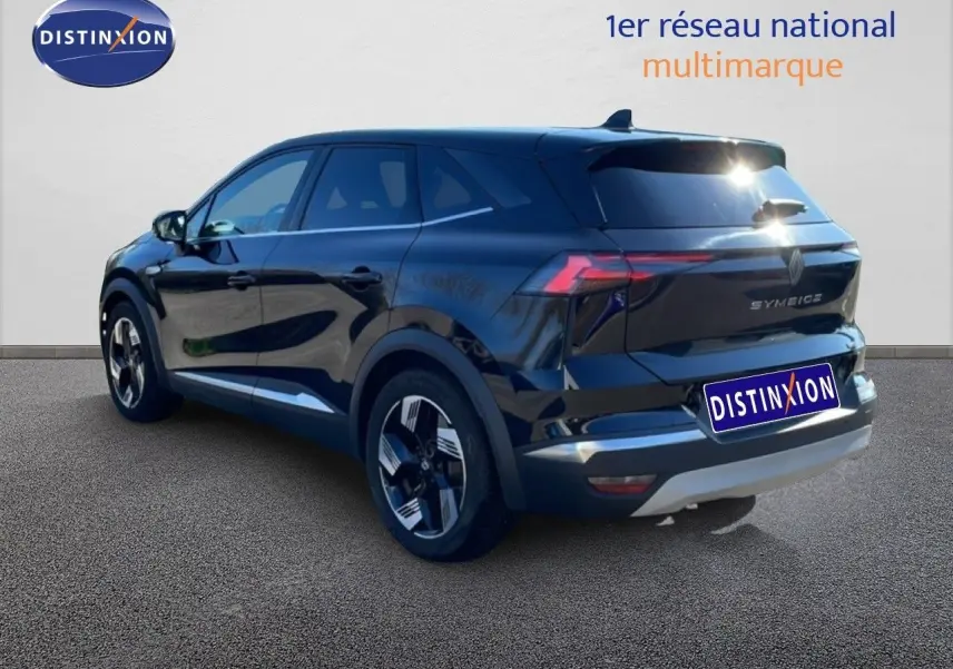 Vue 3/4 arrière droite du Renault Symbioz noir étoile métal, soulignant ses feux LED et jantes bi-ton modernes.
