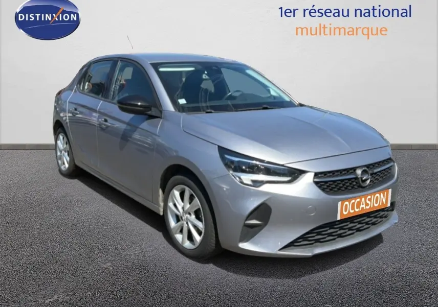 Opel Corsa 1.2 75 Elegance gris quartz métal vue 3/4 avant avec calandre noire et jantes argentées.