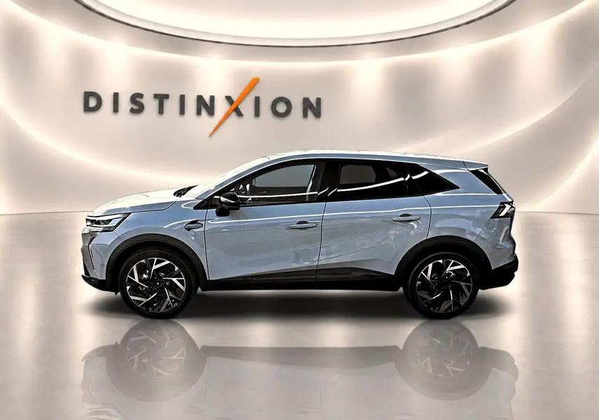 Profil droit du Renault Symbioz gris rafale 2026, SUV hybride avec jantes alu noires et toit blanc.