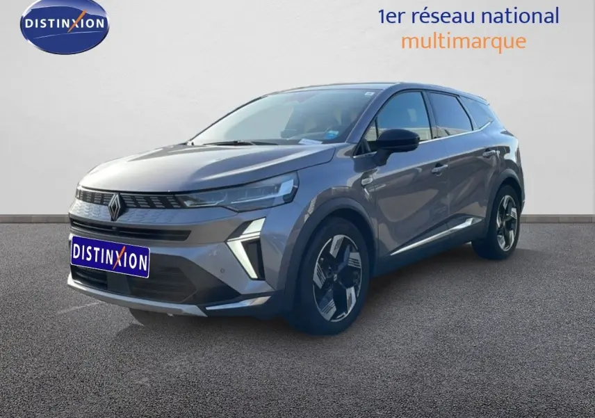 Renault Symbioz gris cassiopée métal en 3/4 avant droit, SUV hybride avec feux LED et jantes modernes.