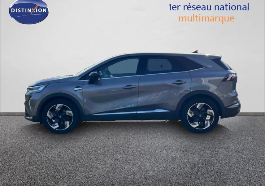 Profil droit du Renault Symbioz 2025 gris cassiopée métal avec jantes au design moderne et vitres teintées.
