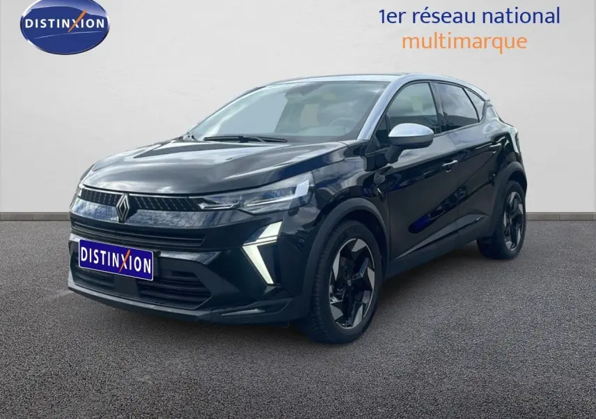 Renault Captur 2025 noir étoile métal avec toit gris, vue 3/4 avant mettant en valeur ses feux LED et jantes biton.