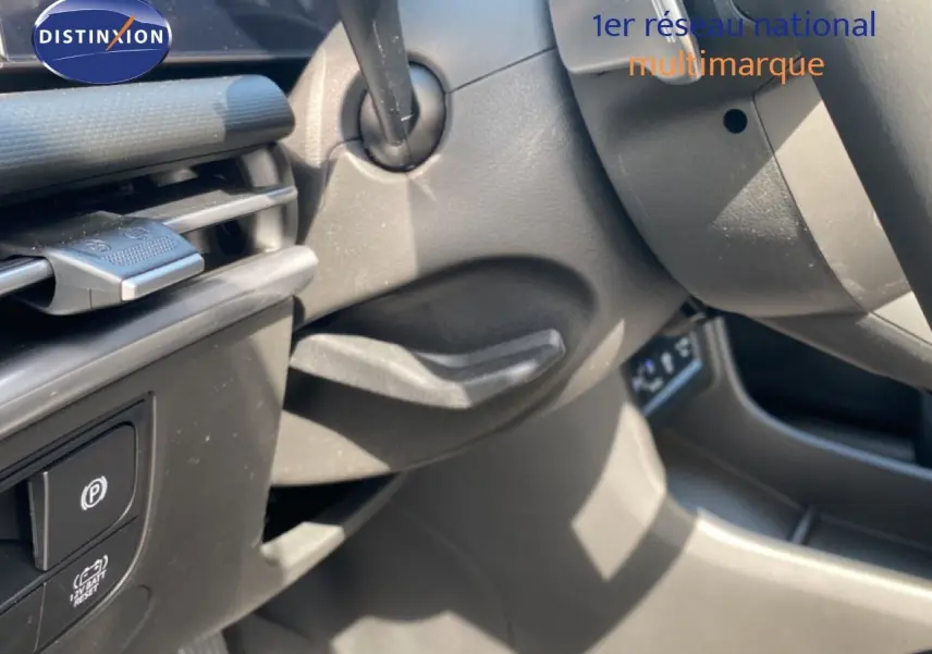 Détail intérieur côté gauche du tableau de bord et commandes du Hyundai Tucson gris Ecotronic 2026.