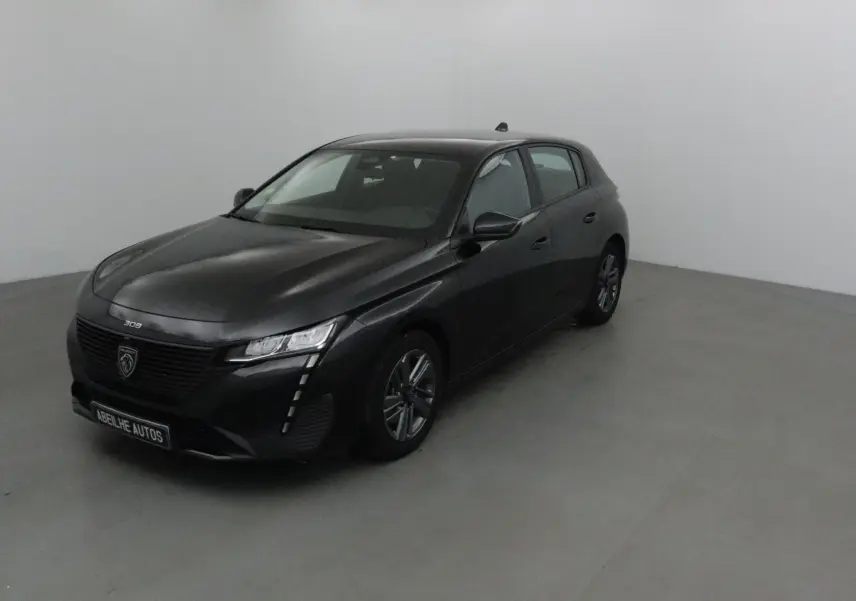 PEUGEOT 308 noir vue 3/4 arrière droit, avec feux arrière LED distinctifs et jantes alliage 16 pouces.