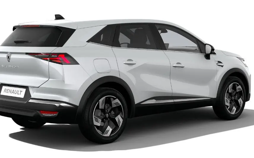 Renault Symbioz blanc nacré vu en 3/4 arrière droit, avec feux arrière LED et jantes bi-ton modernes.